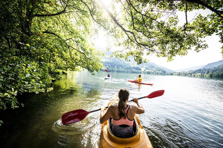 Kayakers on a lake in beautiful Carinthia in Austria