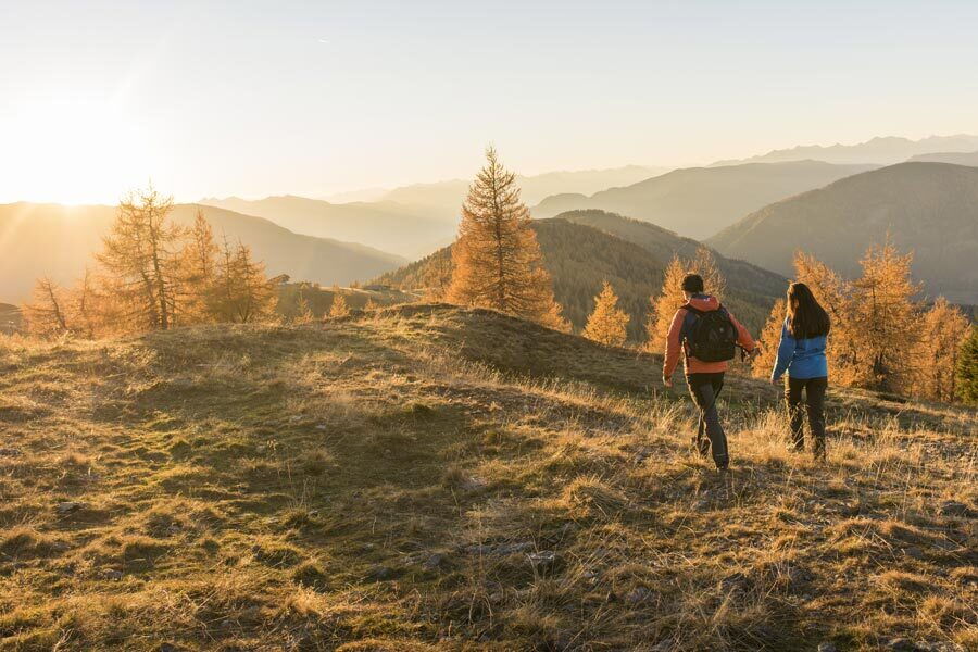 Two hikers on an autumn hike in the Nockberge mountains