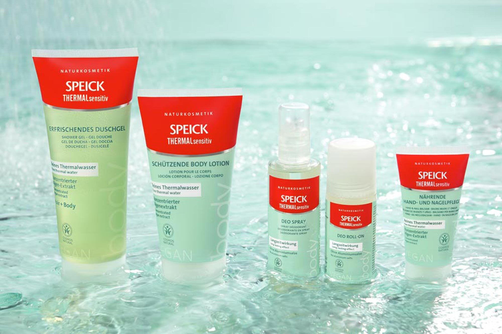 Several products from the Speick cosmetics range stand next to each other in shallow water