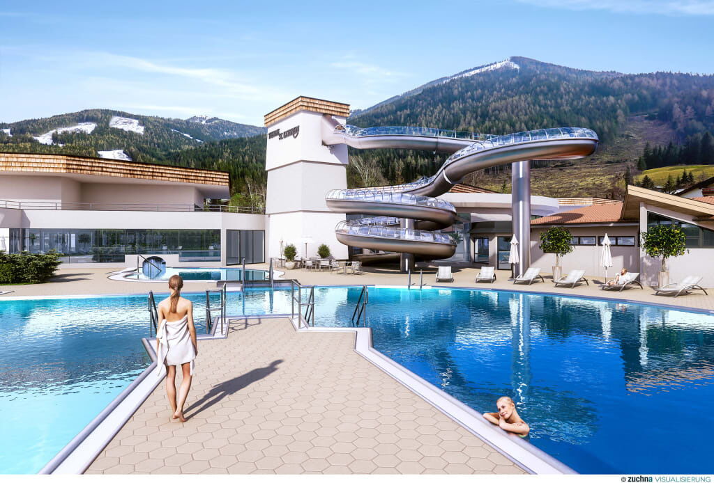 Moderne Schwimmbadlandschaft mit Wasserrutsche und Bergblick in einem Resort-Ambiente