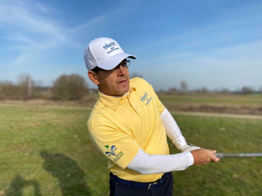 A golfer on a golf course in Bad Kleinkirchheim