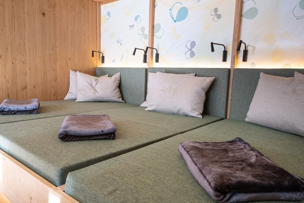 Cosy beds to relax in the spa area; © Mathias Prägant