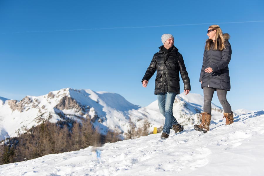 A couple walking on a mountain in Carinthia